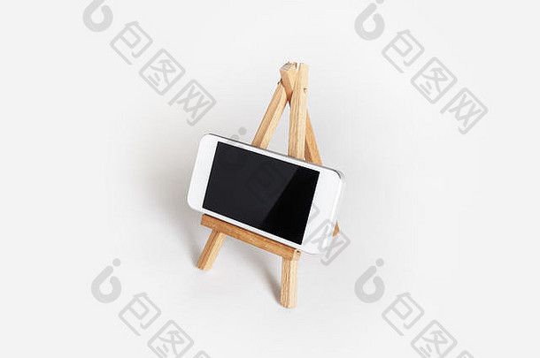 照片移动电话空白屏幕木持有人白色纸背景