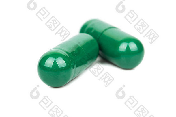 绿色Herbal胶囊孤立的白色背景
