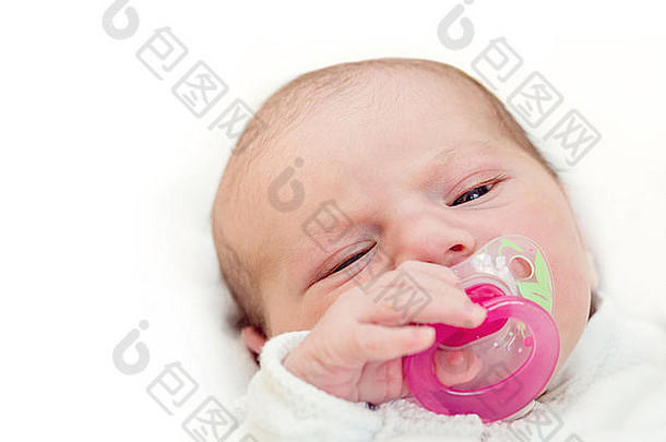 脸可爱的婴儿奶嘴口相机小时生活