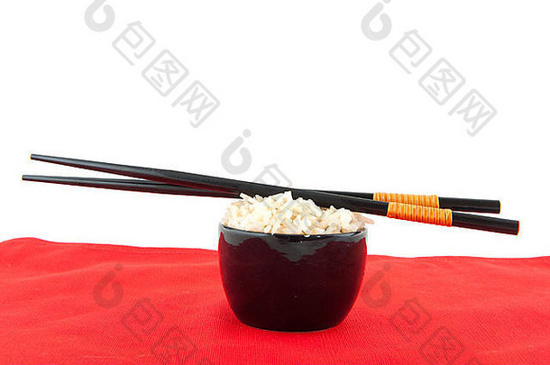 一对筷子和一碗米饭
