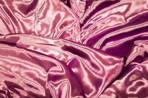 紫罗兰色的织物关闭背景光滑的优雅的丝绸缎纹理背景摘要布料织物织织物背景