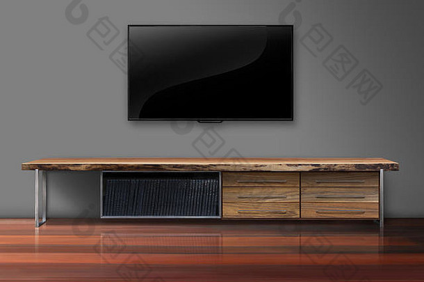 灰色墙壁上的Led电视，木质桌子客厅，现代阁楼风格