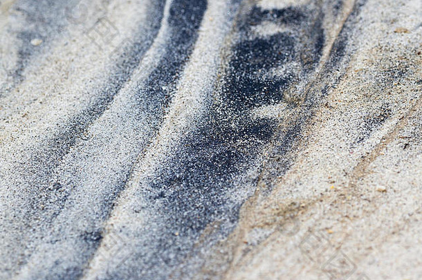 关闭白色沙子补丁黑暗沙子发现太平洋海滩巴拿马