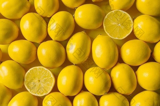 前视图成熟的柠檬黄色的表面背景概念