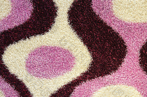 粉红色的地毯模式背景小线程纹理