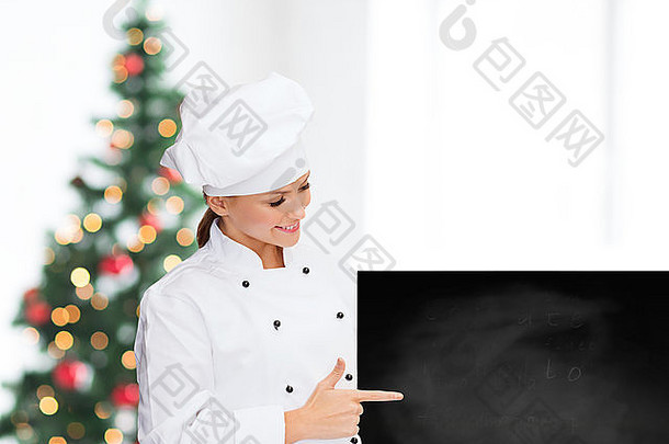 带着白色白板微笑的女厨师