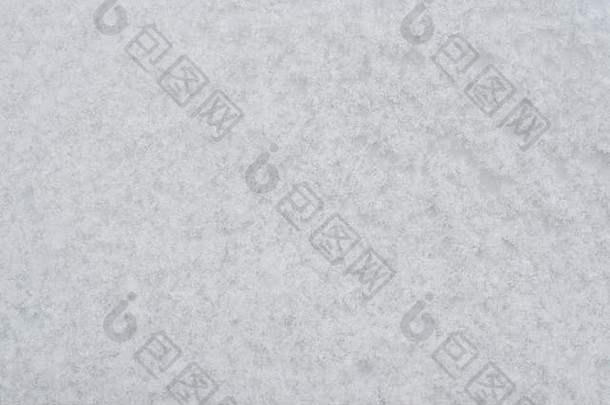 雪花水晶特写。雪背景的纹理