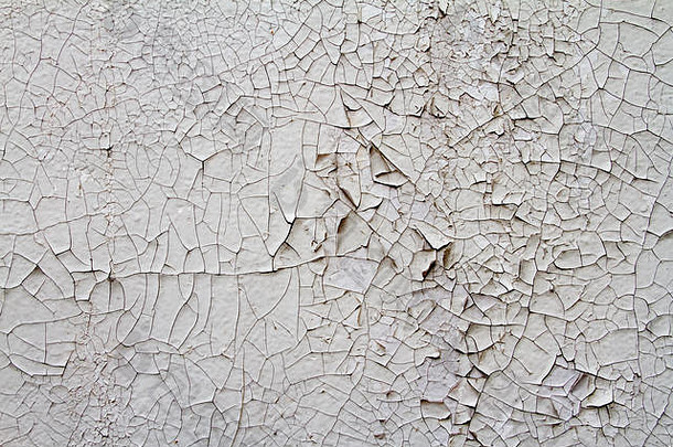 古老水泥上的旧<strong>砖</strong>砌体的复古背景纹理，带有裂缝和旧油漆痕迹。