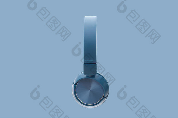 蓝色背景上的蓝牙蓝色耳机studio套装拍摄设备