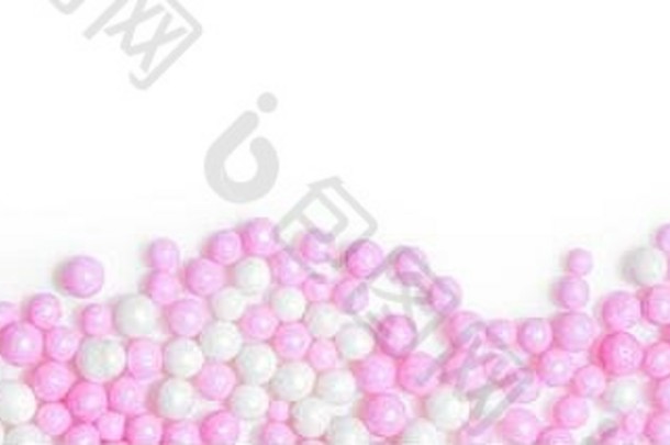 全景甜蜜的粉红色的白色糖珍珠白色背景Copyspace