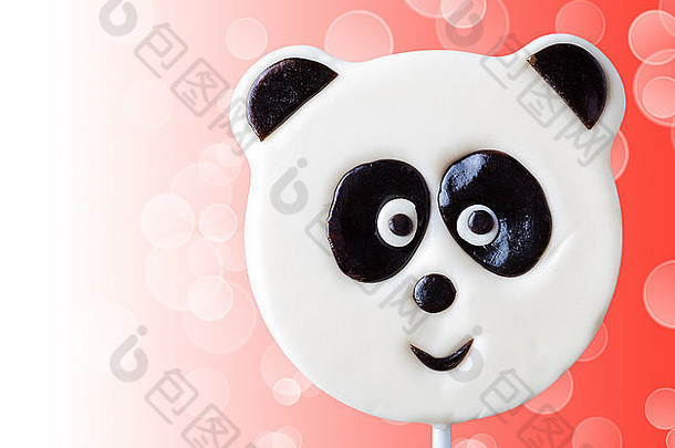 棒棒糖形式熊猫粉红色的背景