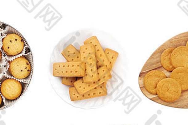 一套独立的圣诞饼干。丹麦黄油饼干、英国短面包和姜饼，从顶部拍摄，背景为白色