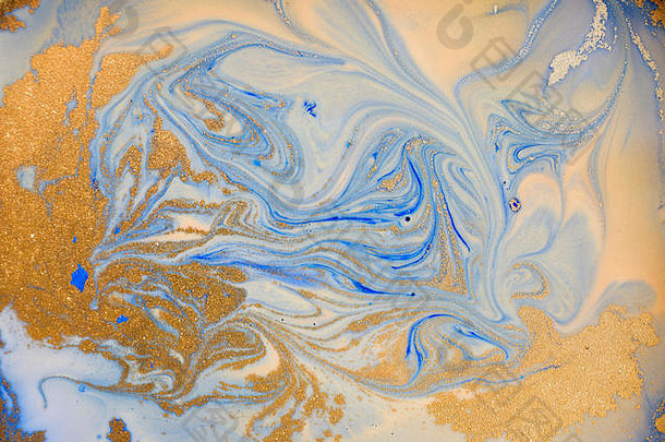 蓝色和金色的液体质地。水彩手绘大理石花纹插图。墨水大理石背景。