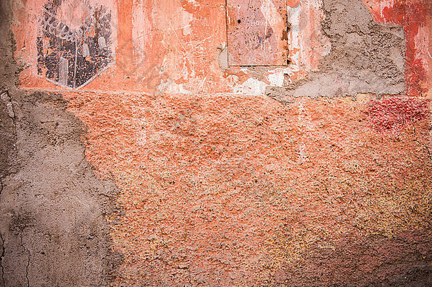 陷入困境的红色的赭色墙修理水泥马拉喀什