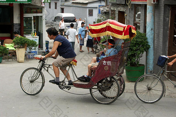 自行车人力车采取游客胡同社区北京中国