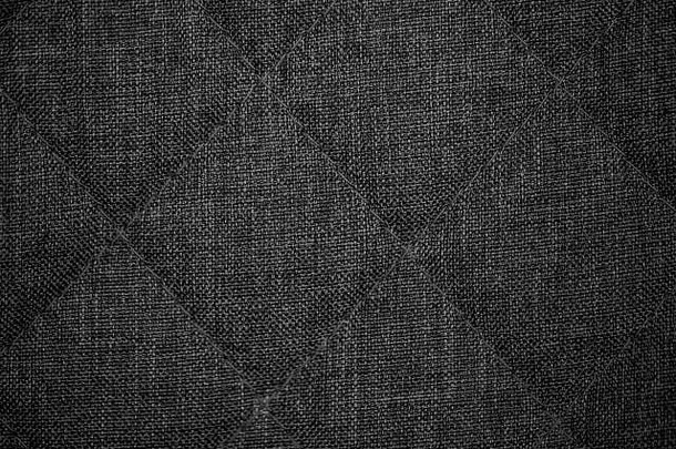 纹理提苏。深灰色针织物背景