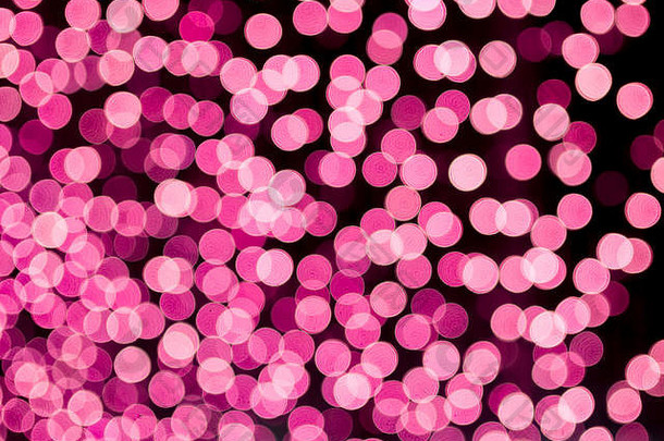 粉色模糊波基光散焦背景和纹理，适用于瓦伦丁、圣诞节、新年假期和庆典背景