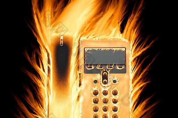 黑色背景上燃烧的手机。