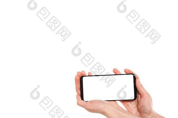 女人手持有黑色的智能手机空白屏幕现代无框架设计孤立的白色背景