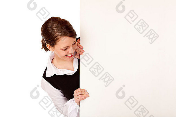 年轻快乐的女人看着空白的广告<strong>空间</strong>。在白色背景上隔离。