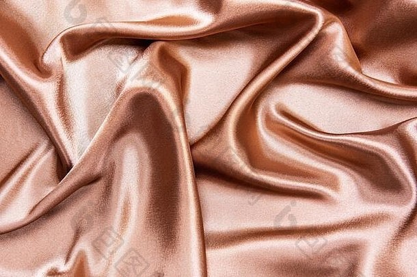 美丽光滑优雅的浅棕色缎面丝织物<strong>纹理</strong>，抽象背景