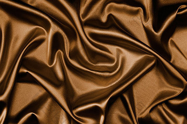 织物棕色丝绸背景，波浪起伏