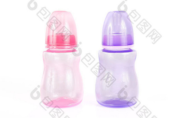 粉红色的紫色的塑料婴儿瓶白色