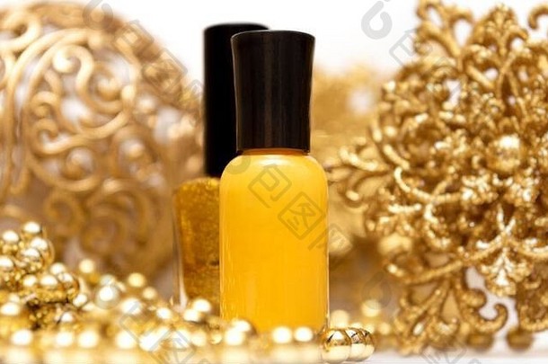 黄色的指甲波兰的瓶圣诞节装饰背景