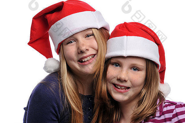 女孩穿圣诞节帽子微笑孤立的白色背景