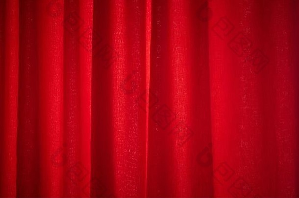 红色油漆背景。红色织物背景。红色织物纹理特写，用于背景。