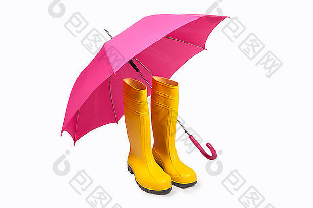 黄色的橡胶靴子粉红色的umbreall孤立的
