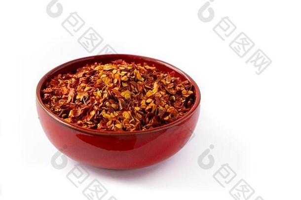 热辣椒片种子红色的彩色的碗孤立的白色背景