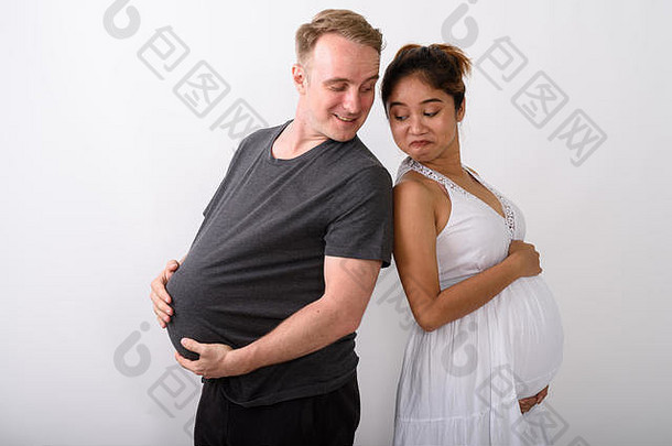 夫妇持有胃怀孕了