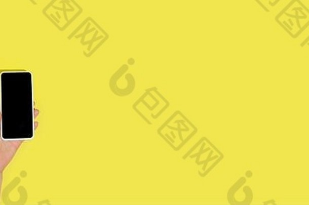 手小工具设备前视图空白屏幕Copyspace简约风格技术现代市场营销负空间摩天观景轮黄色的颜色背景时尚的时尚的
