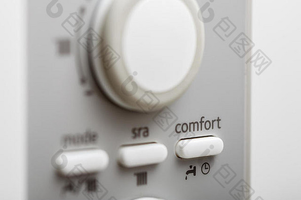 DHW或中央供暖控制面板上的舒适度设置按钮。