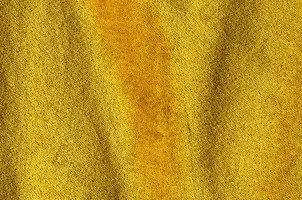 金色安哥拉山羊丝绒类似天鹅绒的织物，与天然丝线混合。马海毛织物。羊绒、天鹅绒绒面革和麂皮效果。为了你