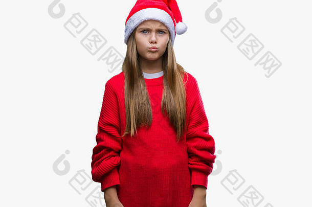 年轻漂亮的女孩，戴着<strong>圣诞</strong>帽，背景孤立，脸颊浮肿，表情滑稽。嘴里充满了空气，表情疯狂。