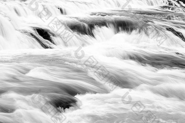 水流。瀑布自然景观。旅游目的地概念。瀑布是最受欢迎的旅游景点。河流湍急的瀑布。格尔福斯瀑布位于冰岛西南部的峡谷河中。
