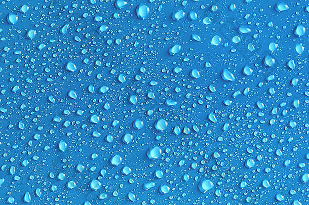 水滴背景蓝色的表面