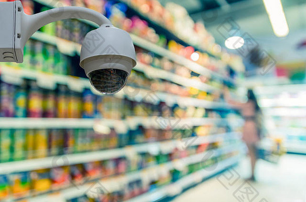 安全摄像头监控百货商店背景中抽象模糊的<strong>店铺</strong>照片，基于安全理念的商业购物