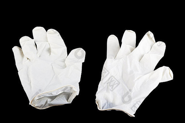 外科手术白色手套孤立的黑色的背景