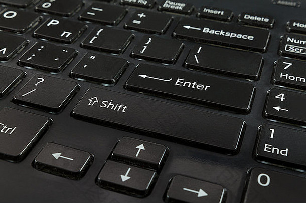 黑色笔记本电脑键盘在浅景深拍摄的特写镜头