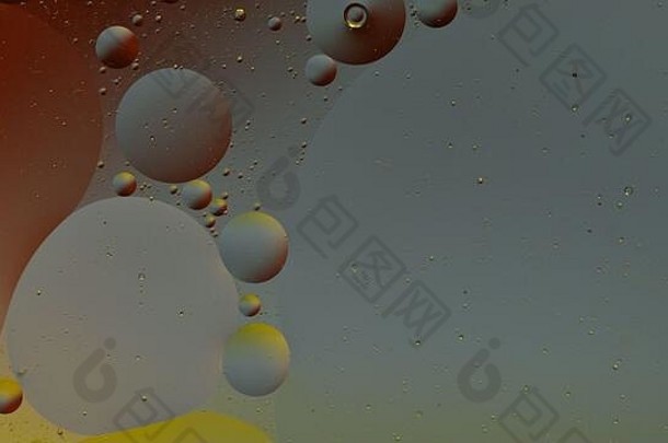 神奇的结构色彩斑斓的石油泡沫混乱的运动摘要色彩斑斓的油漆前视图运动泡沫液体水表面五彩缤纷的背景宏模式设计