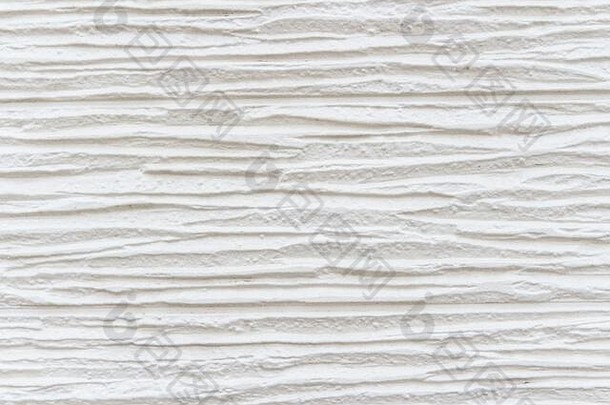 白色条纹背景。白色石墙的高细节碎片。