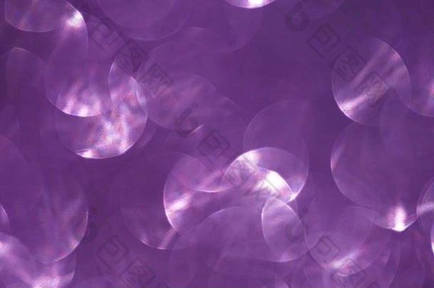 抽象薰衣草紫丁香散焦波基紫色闪光五彩碎纸背景。节日的概念。