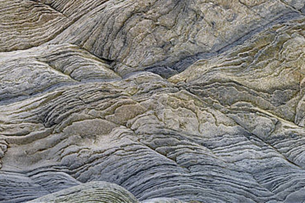 加拿大新不伦瑞克省芬迪角海湾波浪状岩石沉积层抽象图案全景图