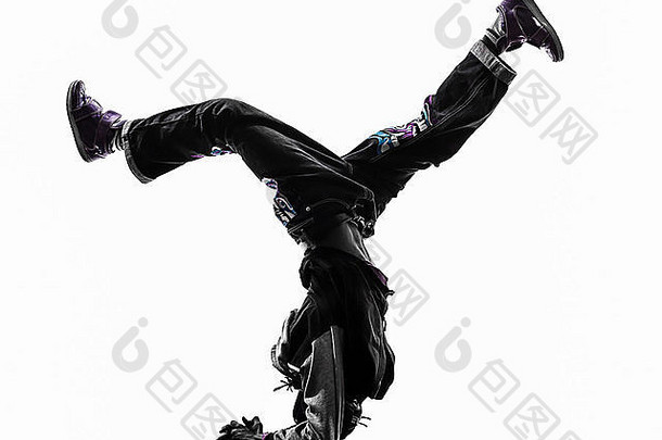 一个嘻哈杂技霹雳舞者霹雳舞年轻男子倒立剪影白色背景