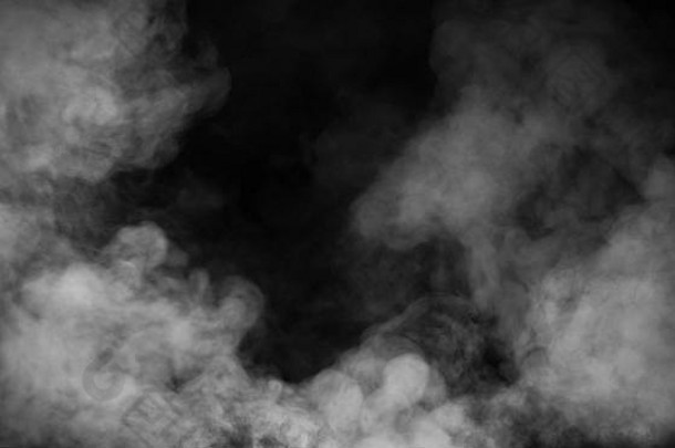 抽象烟雾在孤立的黑色背景上。纹理覆盖。设计元素。