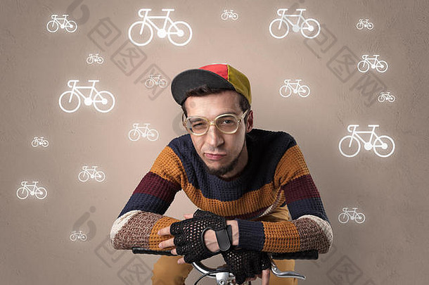 以<strong>线条画</strong>自行车为背景的年轻可笑的自行车手