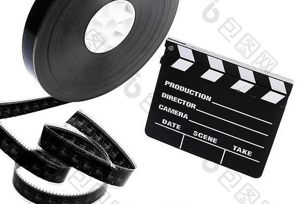 一个黑色的电影盒式卷轴和一个电影院的<strong>拍手声</strong>被隔离在白色的屏幕上